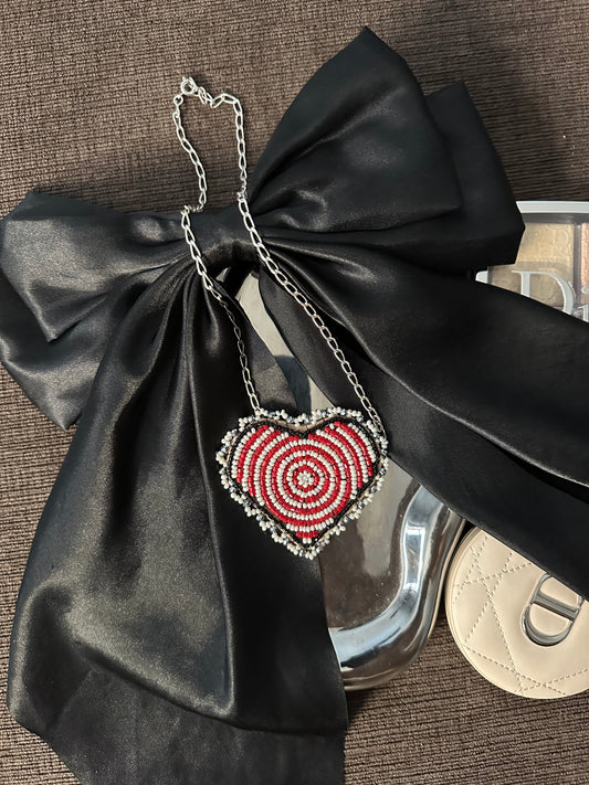 koskwesin (dizzy) necklace.