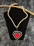 manitô-mîkis[sacred bead] • necklace